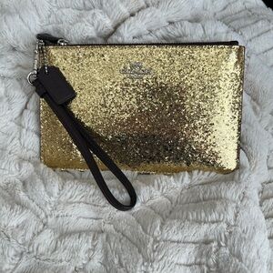 Coach The Wizard Of Oz Collection Sparkling Gold Wristlet with Leather details